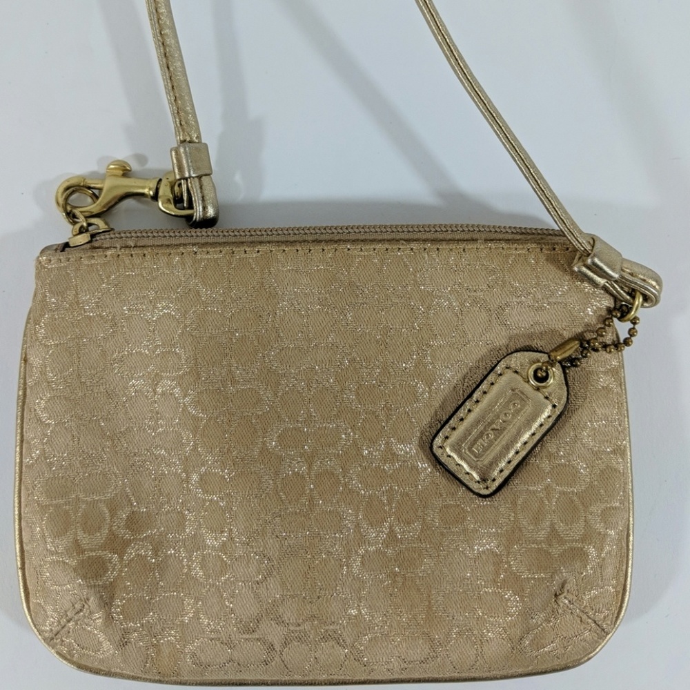 Coach signature print gold wristlet